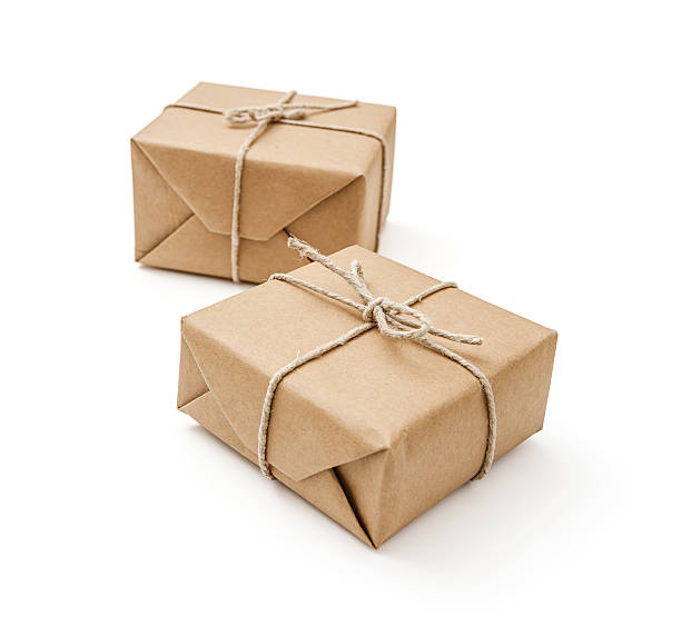 istock Parcels wrapped with brown paper and tied 512747307