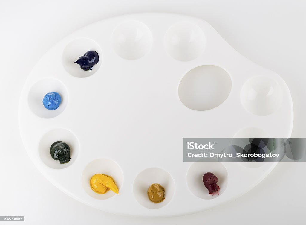 paint palette paint palette Isolated on white background Acrylic Painting Stock Photo