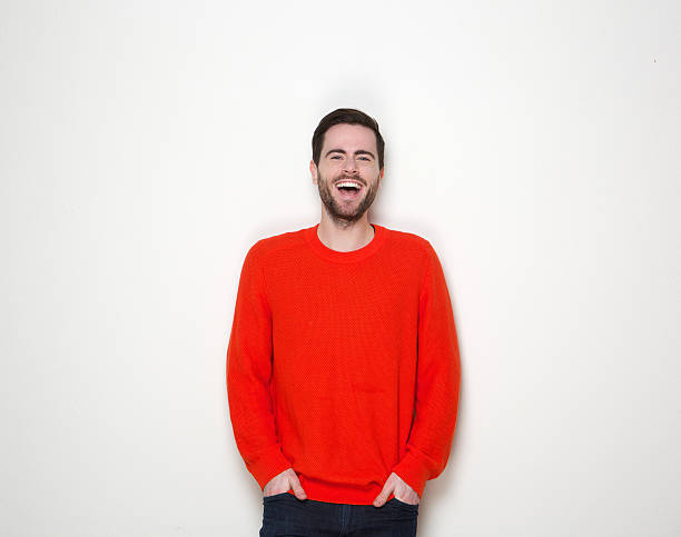 istock Portrait of a young man with beard laughing 512748955