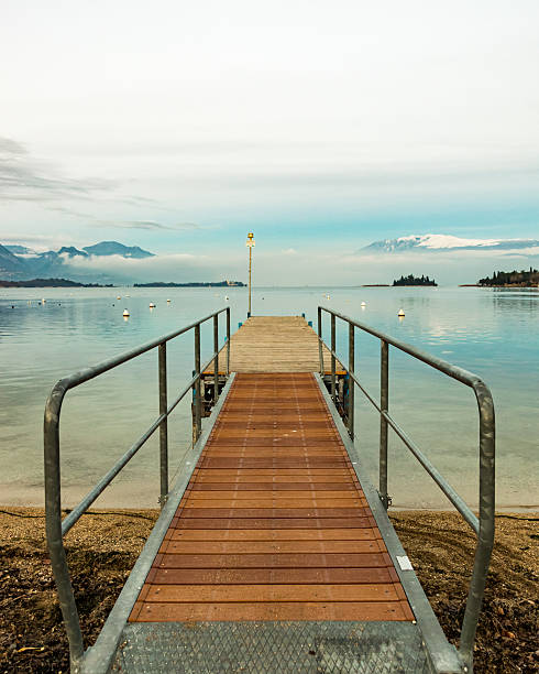 istock Walkway over the Lake Garda, Italy. 512749406