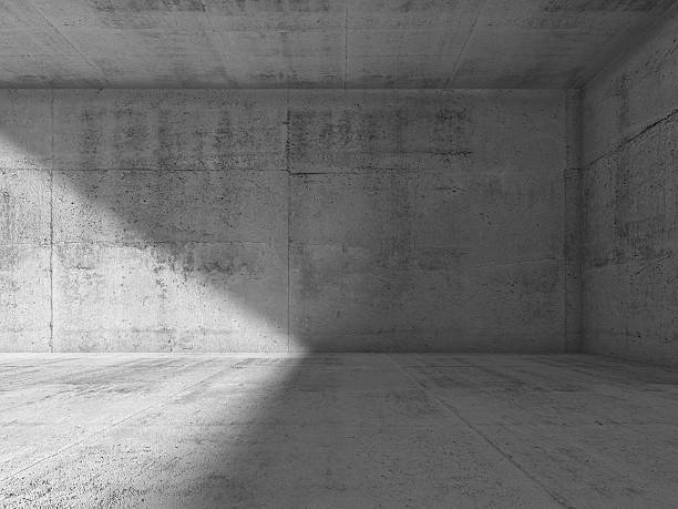 istock Abstract interior of empty dark concrete room 512750196