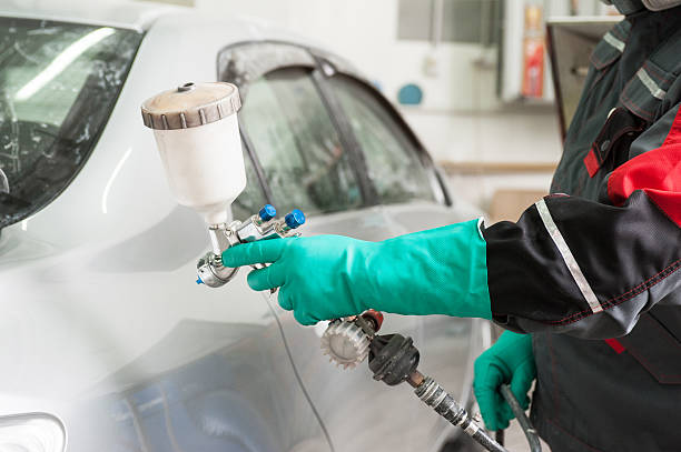 istock painting a car 512750326