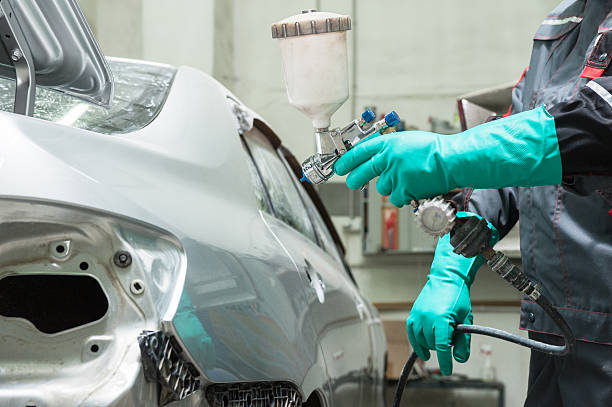 painting a car spray gun with paint for painting a car  bodywork stock pictures, royalty-free photos & images