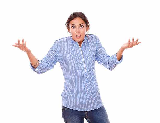 istock Confused charming woman holding up her hands 512751547