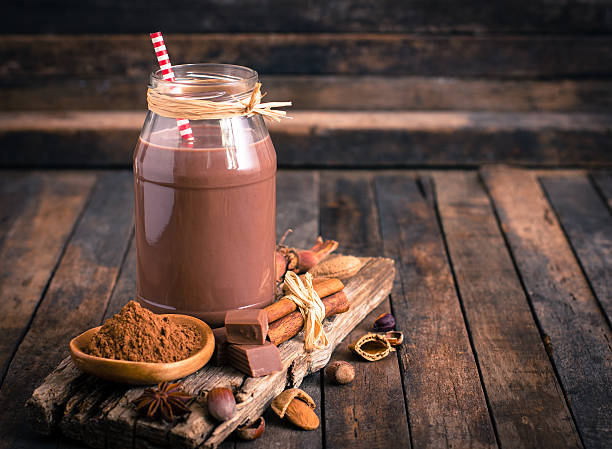 Chocolate milk in the jar Chocolate milk in the jar  chocolate shake stock pictures, royalty-free photos & images