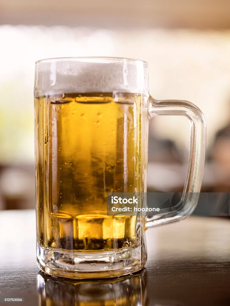 Glass of beer in a pub Alcohol - Drink Stock Photo