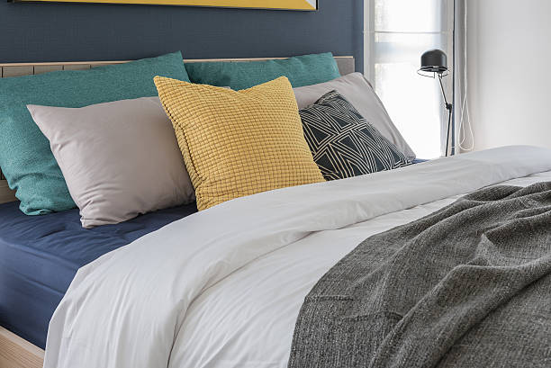 istock modern bedroom with colorful pillows 512753292