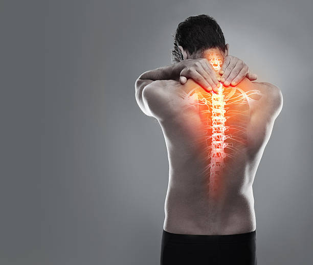 targeting mal di schiena - back rear view pain physical injury foto e immagini stock