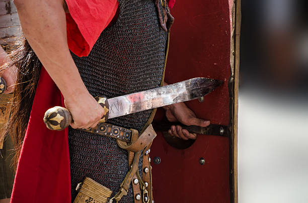 istock Roman soldier legionary with sword 512754480