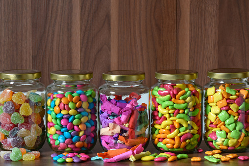 Various sugary candy in a glass jar