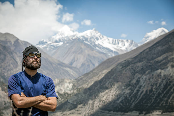 istock Man hiker Hiking Around Annapurna Trek, Nepal 512755526