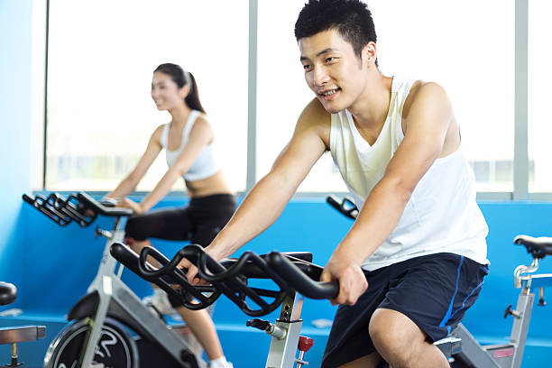 istock young people working out in modern gym 512756022