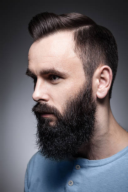 istock studio portrait of stylish bearded man; 512756660