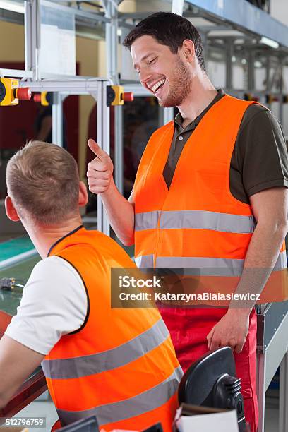 Controller Showing Satisfaction From Employees Work Stock Photo - Download Image Now