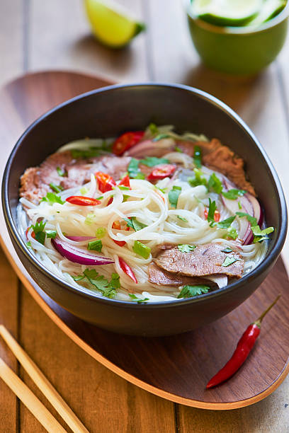 istock Rice noodle soup with sliced beef 512798239