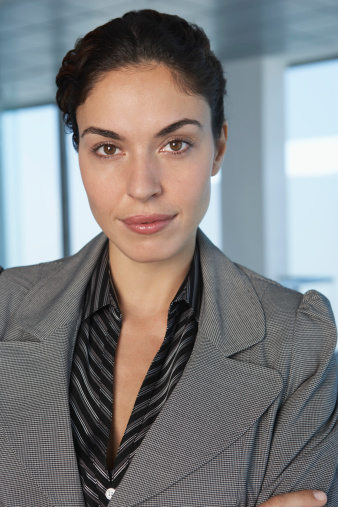 Closeup portrait of young businesswoman in office
