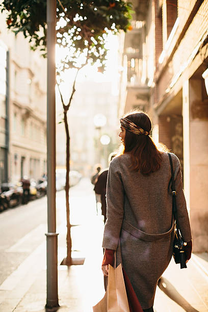 istock Window shopping in Barcelona on a winter noon. 512800416