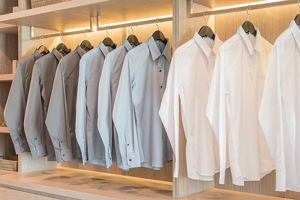 istock row of shirts hanging on rail 512800900