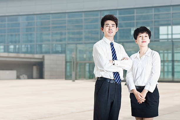 istock Two successful business people standing outdoor 512801149