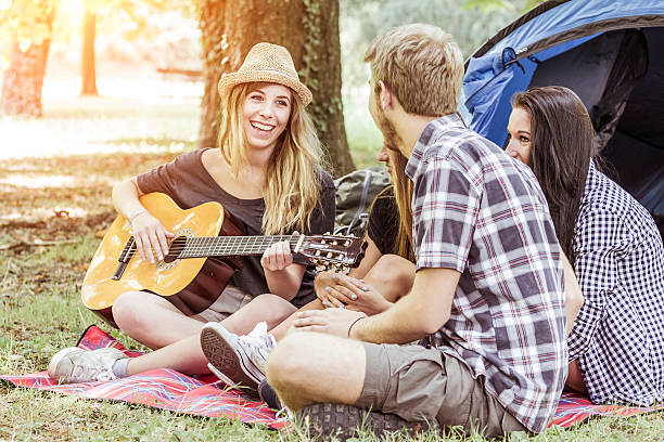 istock Group of friends having fun at camping 512801305