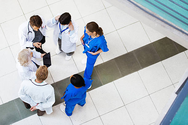istock Group of Doctors Discussing Results 512801633