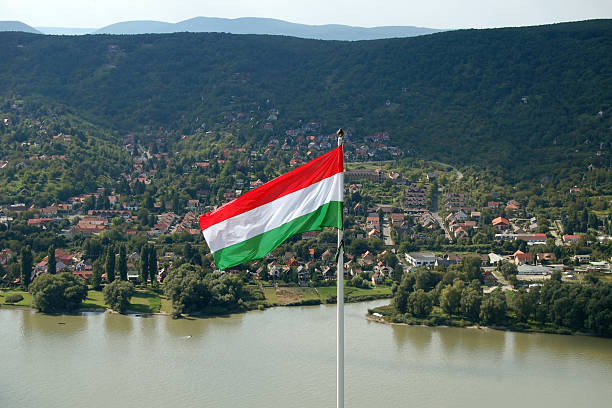 istock hungarian flag with beautiful landscape 512801643