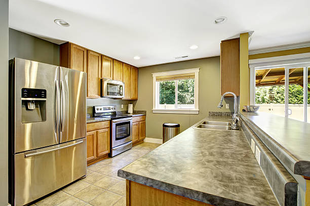 istock Kitchen interior. Granite tops and steel appliances 512803035