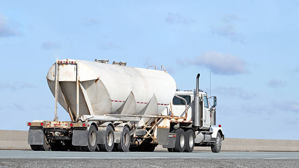 istock Construction Industry, Semi Truck Hauling Cement On Interstate Highway 512803053
