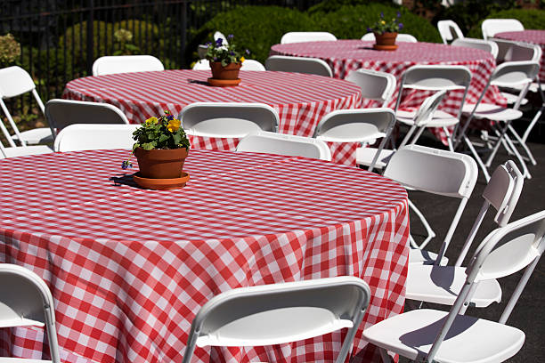 istock outdoor dining tables with red and white checkered tablecloths 512803817