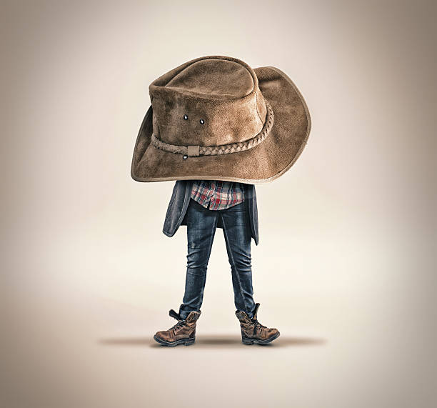 The young girl with an oversized hat on her head. It is pulled over her head.