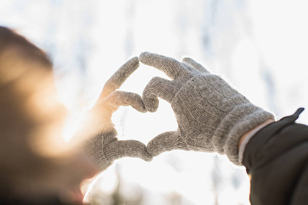 istock hands in shape of love heart 512806122