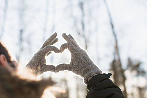 istock hands in shape of love heart 512806178