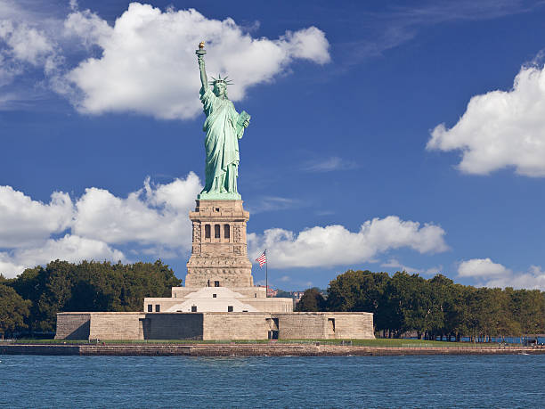 istock Statue of Liberty with Blue Sky and Clouds, New York. 512806294