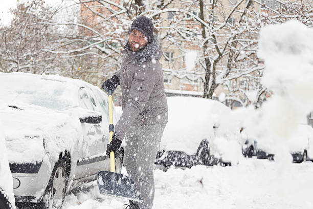 istock Man shoveling snow in winter. 512809124