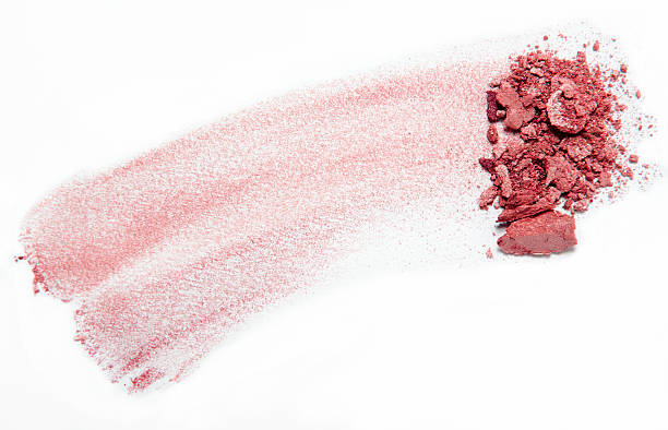 istock pink crumbled eyeshadow blush with brush stroke on white background 512814828