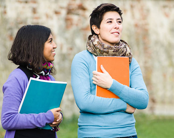 istock Female college student on the park 512817000