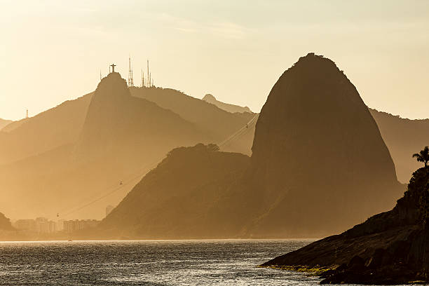 istock Sugar Loaf and Christ the Redeemer Statue by Sunset 512819200