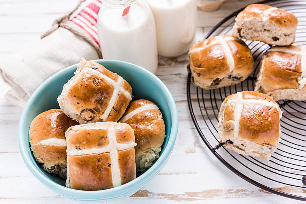 istock Easter traditional breakfast, hot cross bun and Easter eggs. 512819890