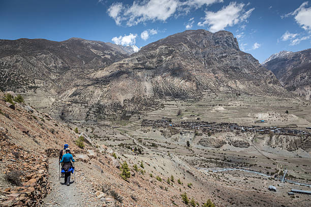 istock Two Hikers Hiking Climbing Annapurna Trek, Nepal 512821676