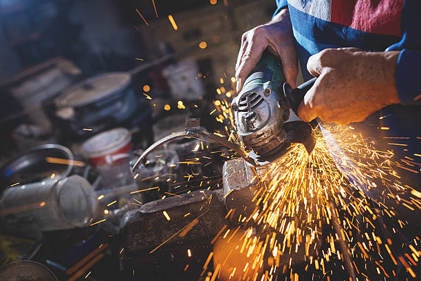 istock Craftsman sawing metal. 512822536