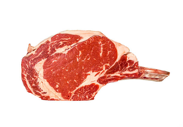 Prime rib steak cut Prime rib steak isolated on white background rib eye steak stock pictures, royalty-free photos & images