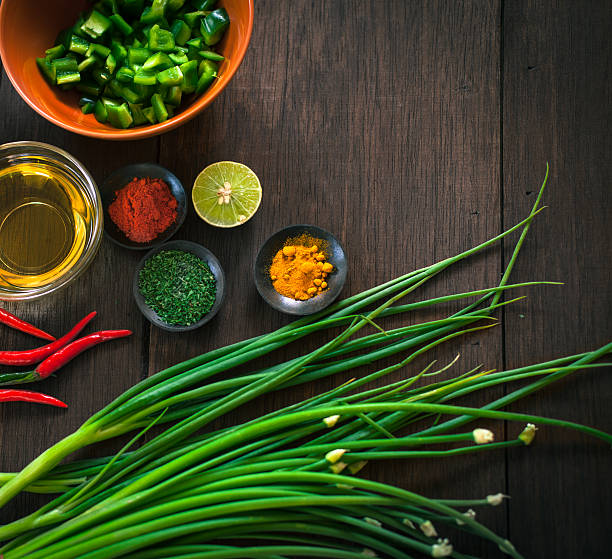 istock Various of spices and vegetable on dark rustic wooden background 512825408