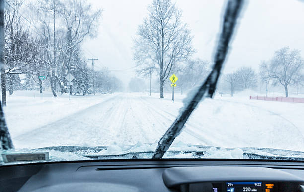 Windshield Wipers Clearing Car Windshield During Blizzard Snow Storm Stock  Photo - Download Image Now - iStock