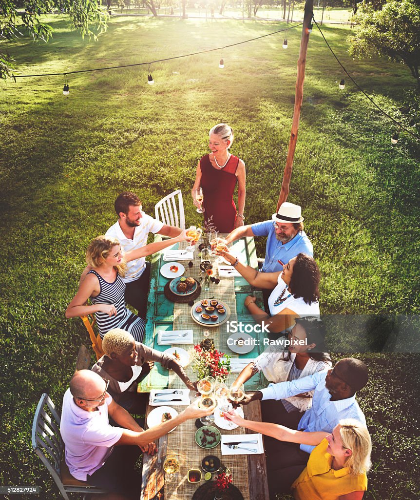 Friends Dining Outdoor Nature Garden Concept Picnic Stock Photo