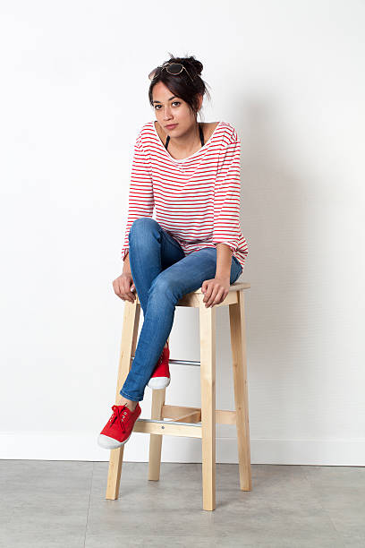 istock young multi-ethnic female student relaxing thinking about her vacation 512828638