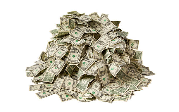 Pile of Money Pile of money on white background. american one dollar bill stock pictures, royalty-free photos & images