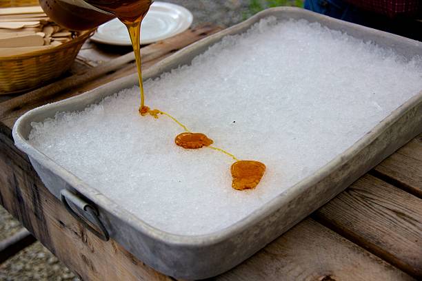 istock Making maple syrup taffy at the sugar shack 512830747