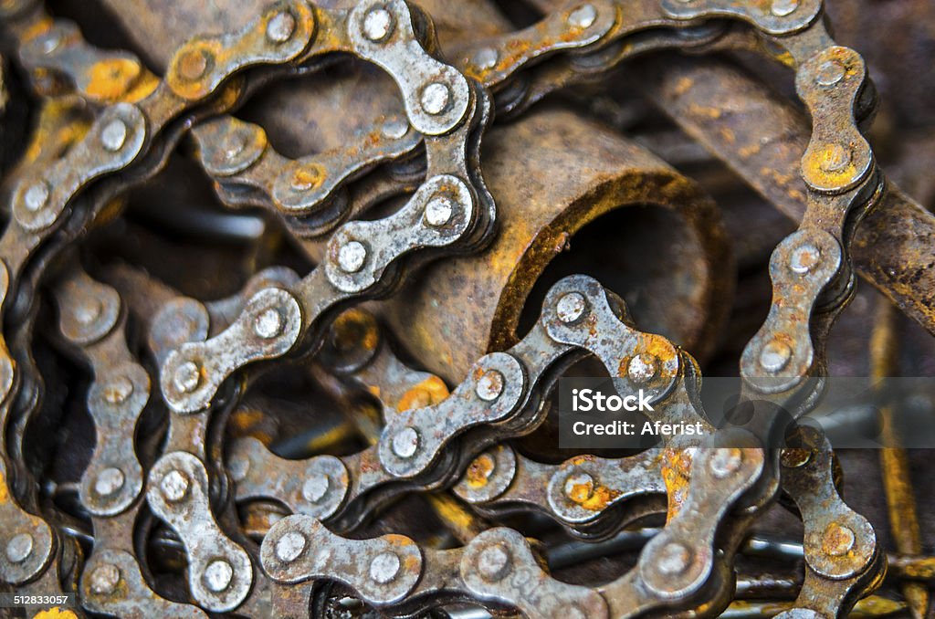 scrap metal Rusty metal, bicycle chain, pipe. Bicycle Chain Stock Photo