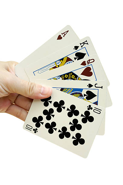istock Hand with playing cards, isolated on white 512833535