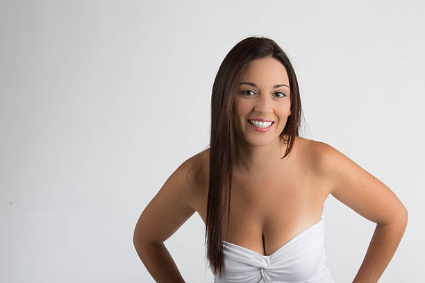 istock Happy woman standing with her hands on her hips 512836077